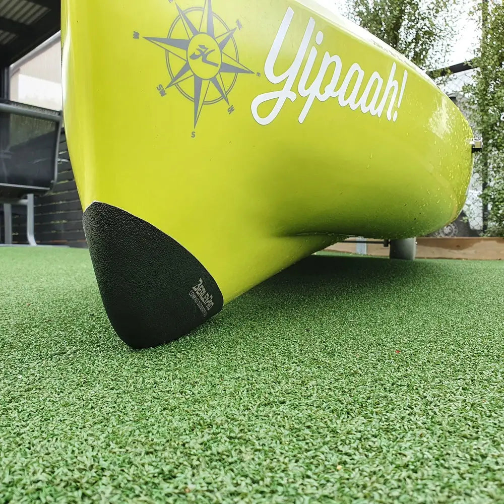 Bumper Bro keel guard fitted to the bow of a lime green Hobie Compass Duo tandem fishing kayak