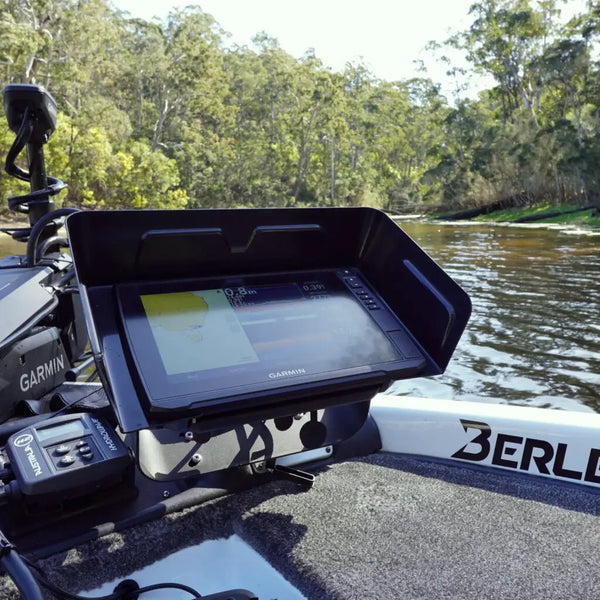 Garmin screen under a BerleyPro visor mounted on a fishing kayak