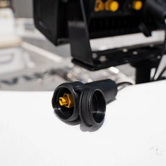 Connector Protector plug cover swung open to reveal the gold socket pins beneath