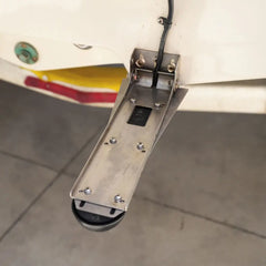 Rooster Rooter deflector fitted around a Lowrance transducer on a white boat transom