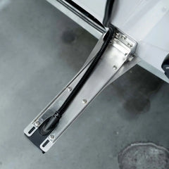 Rooster Rooter deflector fitted along a Lowrance HD transducer bracket on a transom
