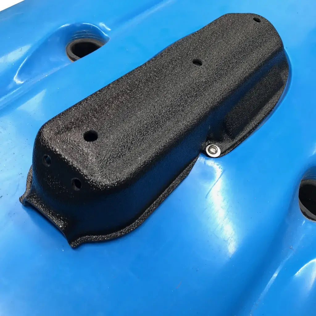 Textured Raymarine RV-100 transducer mount on a carribean blue Hobie kayak hull