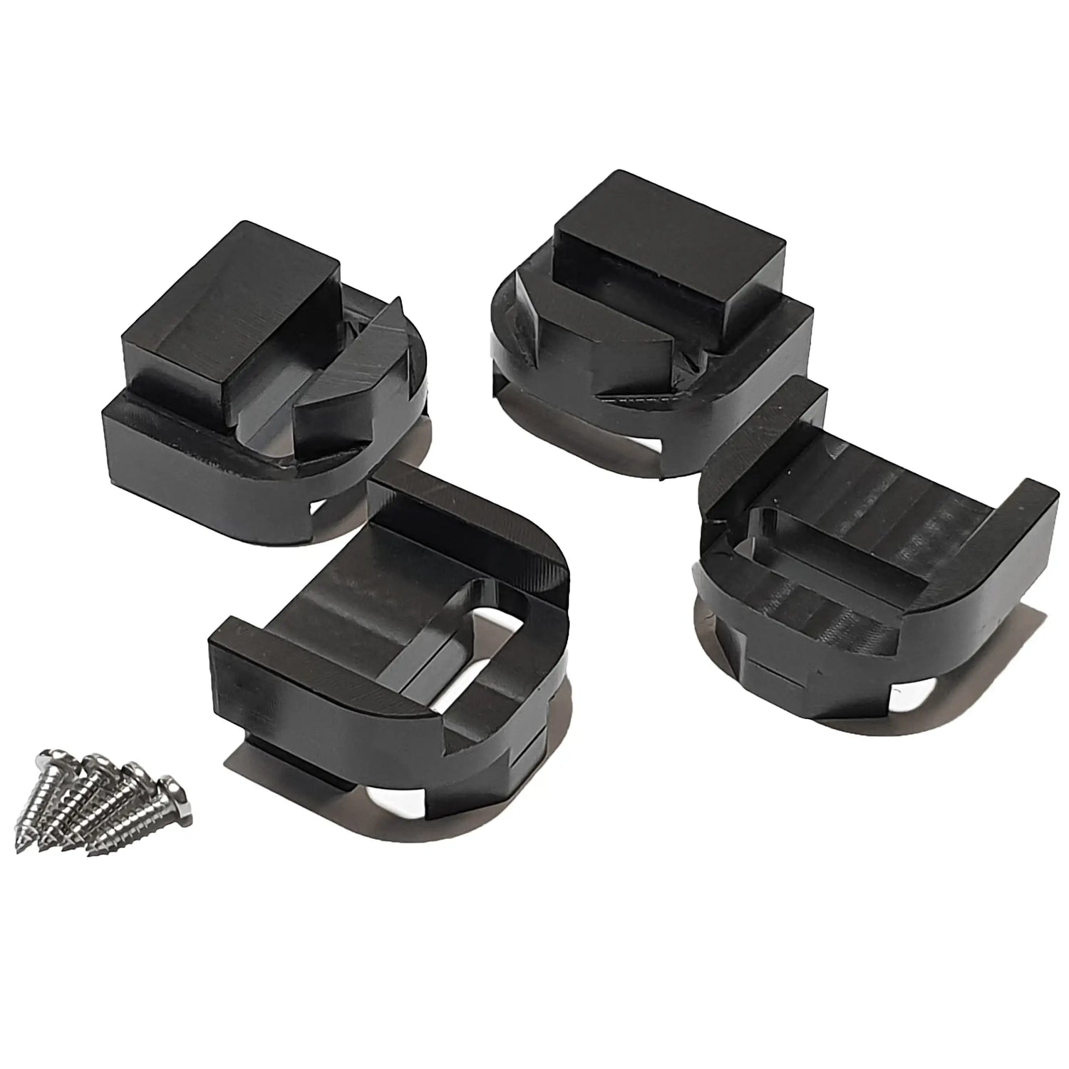 Set of four black Compass seat riser blocks with their stainless mounting screws