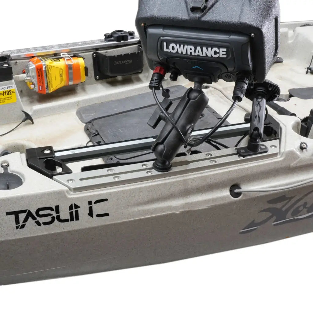 Hobie Outback kayak deck with a Lowrance unit and rod holders mounted on Titan tracks