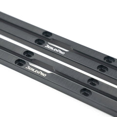 Close-up of two black BerleyPro gear tracks showing the countersunk fixing holes