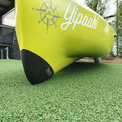 Bumper Bro keel guard fitted to the bow of a lime green Hobie Compass Duo tandem fishing kayak