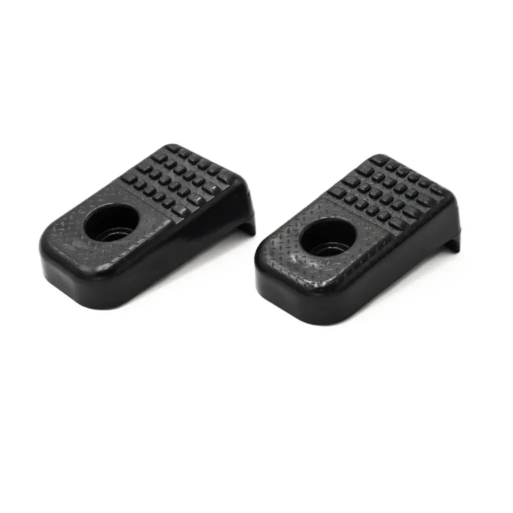 Pair of upgraded Hobie Lynx skid plates in black with grooved tread and centre holes