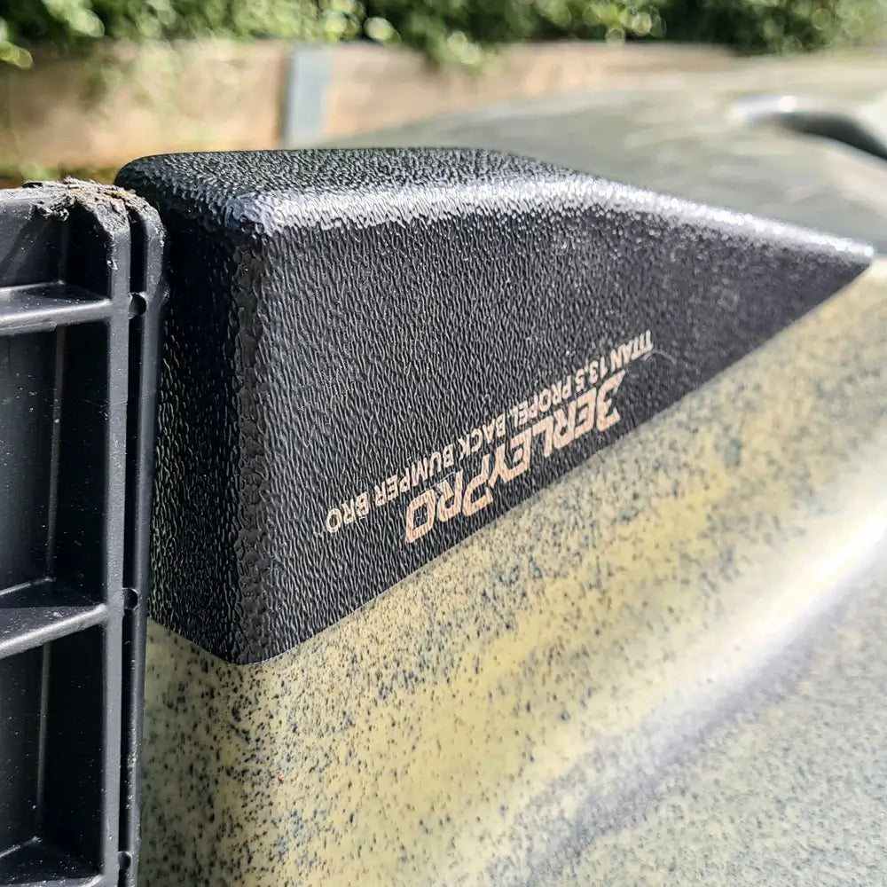 Bumper Bro fitted to an olive camo Native Titan kayak hull