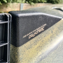 Bumper Bro fitted to an olive camo Native Titan kayak hull
