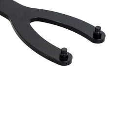 Close-up of the black forked Propel service spanner end and its two drive pins