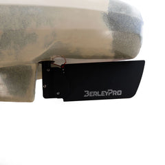 Wider black rudder blade fitted beneath the stern of a khaki Native kayak