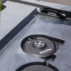 T-Lock steering wheel installed flush in the recess of a grey Native kayak deck