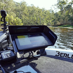 Garmin screen under a BerleyPro visor mounted on a fishing kayak