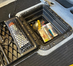 Bucket Bro fitted in a kayak rectangular hatch, loaded with tackle packets and a mesh tray
