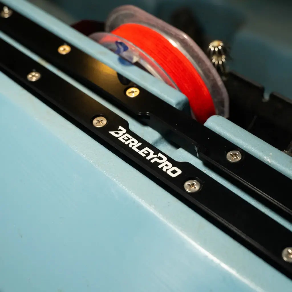 BerleyPro heavy duty track mount bolted to the deck of a Hobie Compass fishing kayak