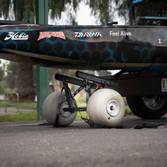 Kimmi Cart kayak trolley carrying a blue camo Hobie Pro Angler 14 fishing kayak