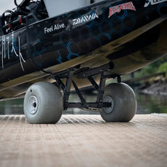Blue camo Hobie Pro Angler 14 on the Kimmi Cart kayak trolley, viewed from the stern on a ramp