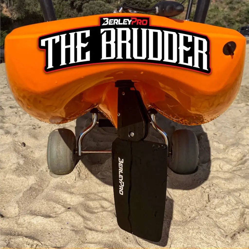 The Brudder fitted to Hobie Compass kayak stern on sand with the rudder deployed